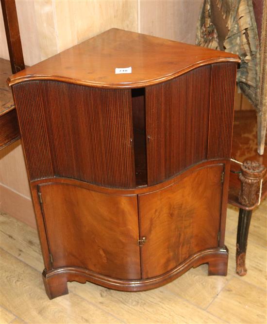 A George III serpentine corner cupboard W.63cm